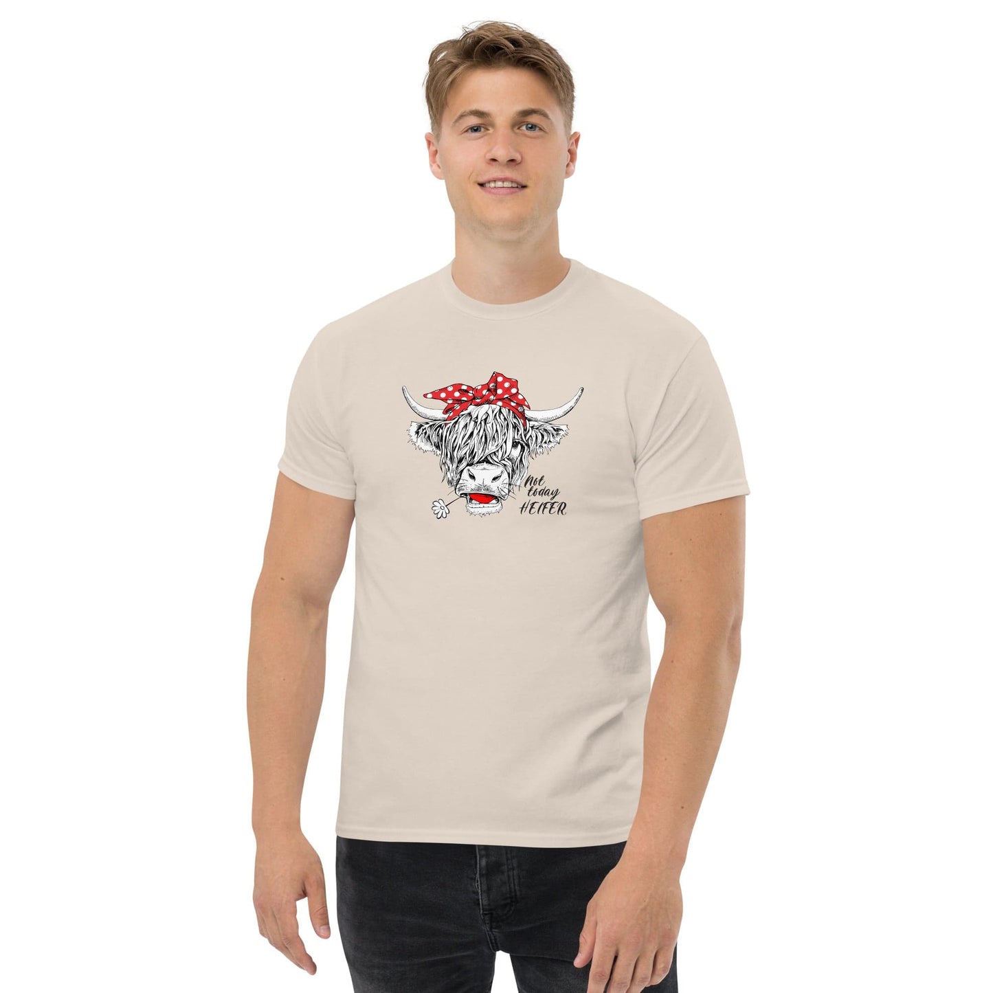 Beige t-shirt with cow graphic.